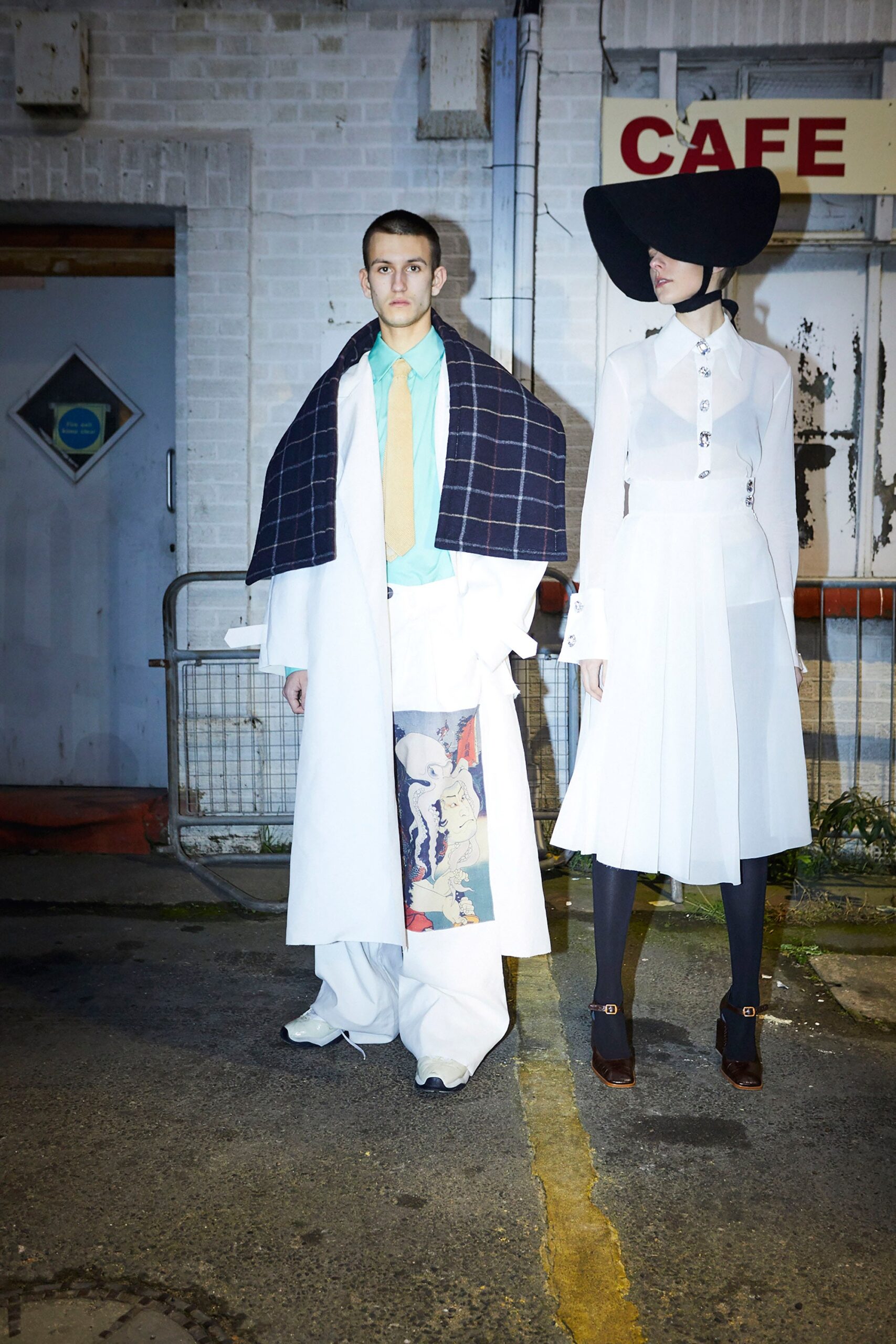 white coat and skirt with black hat