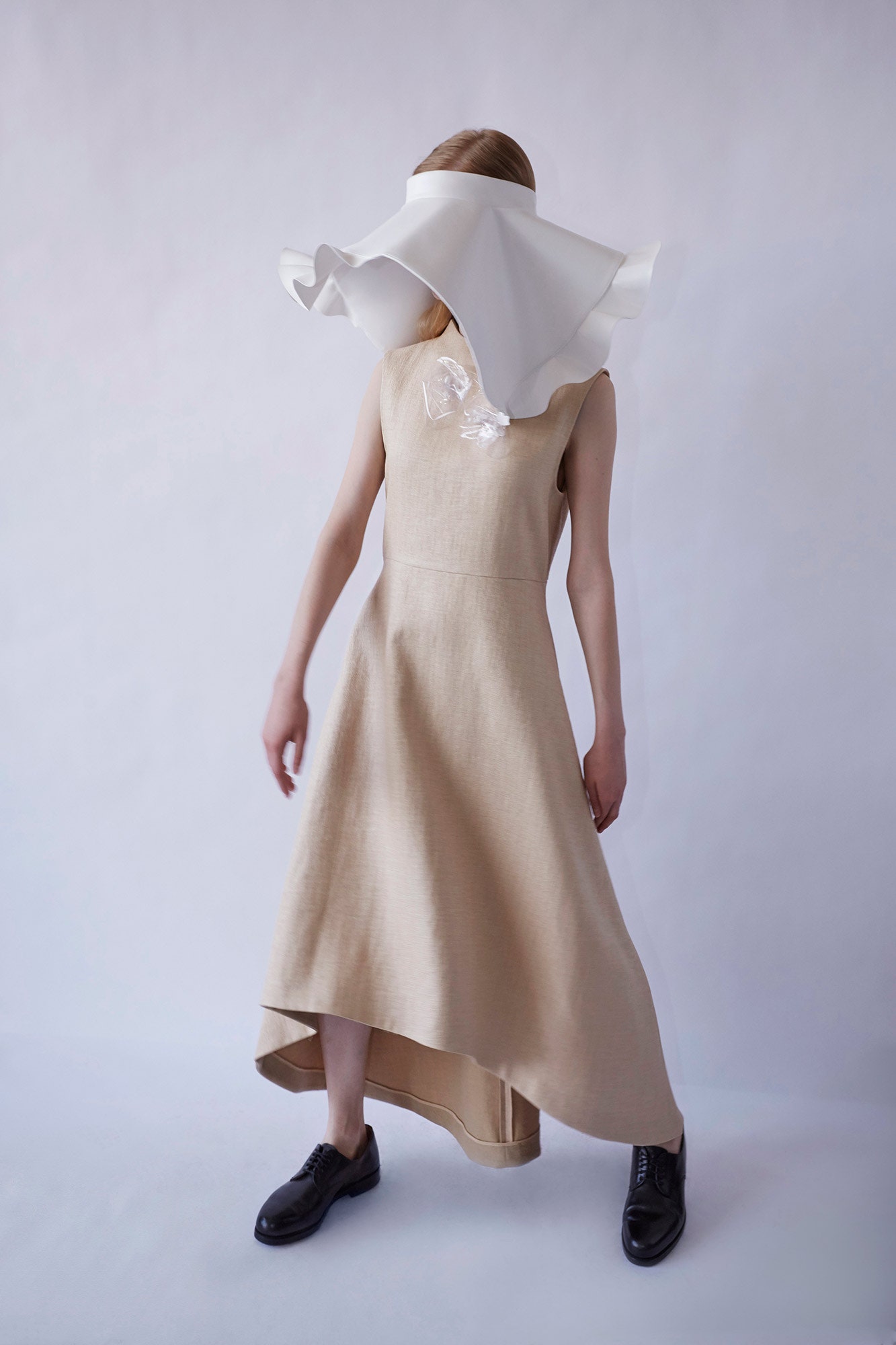 beige linen sleeveless high-neck fitted midi dress