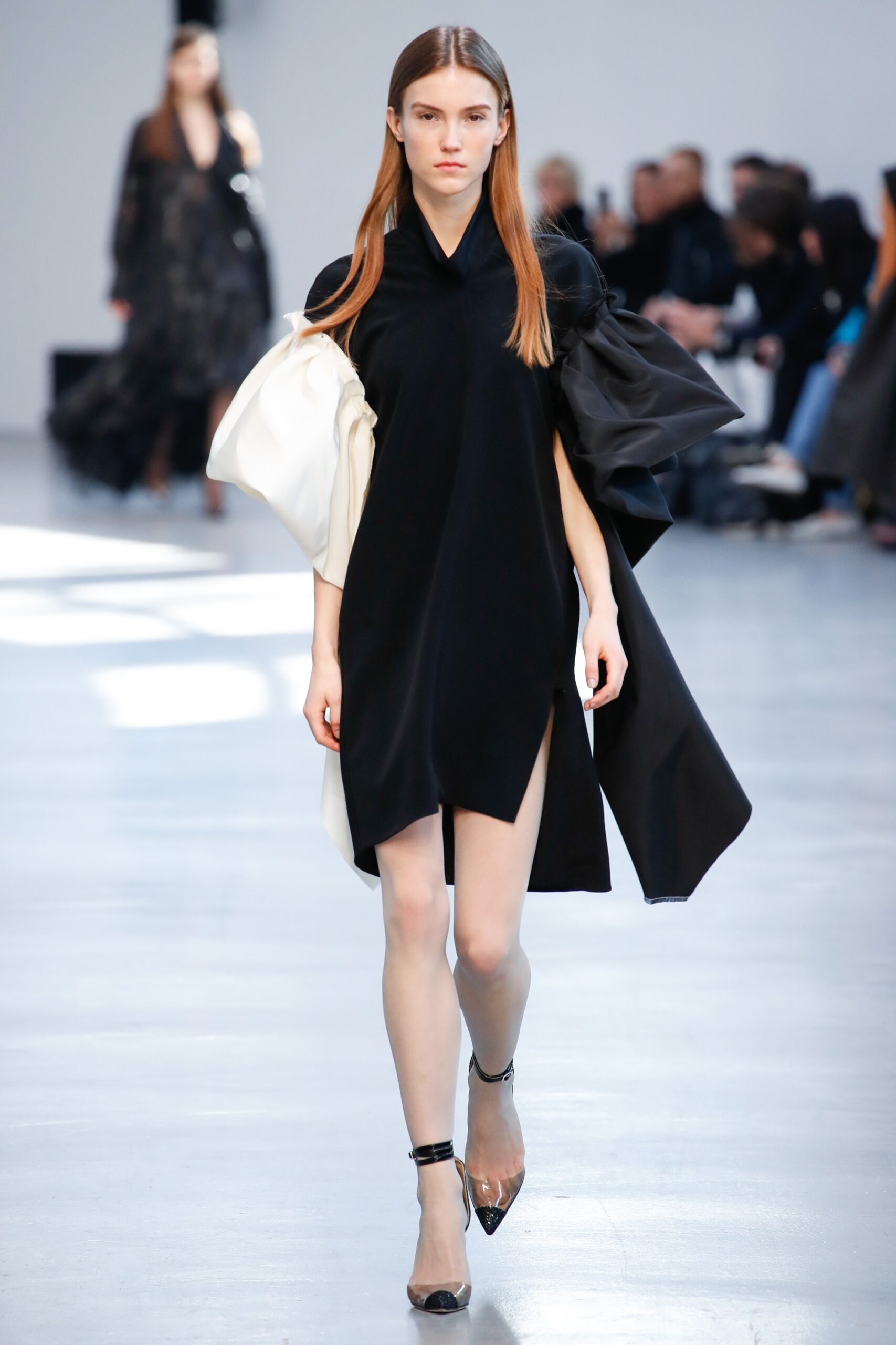 black silk mini dress with white jacket