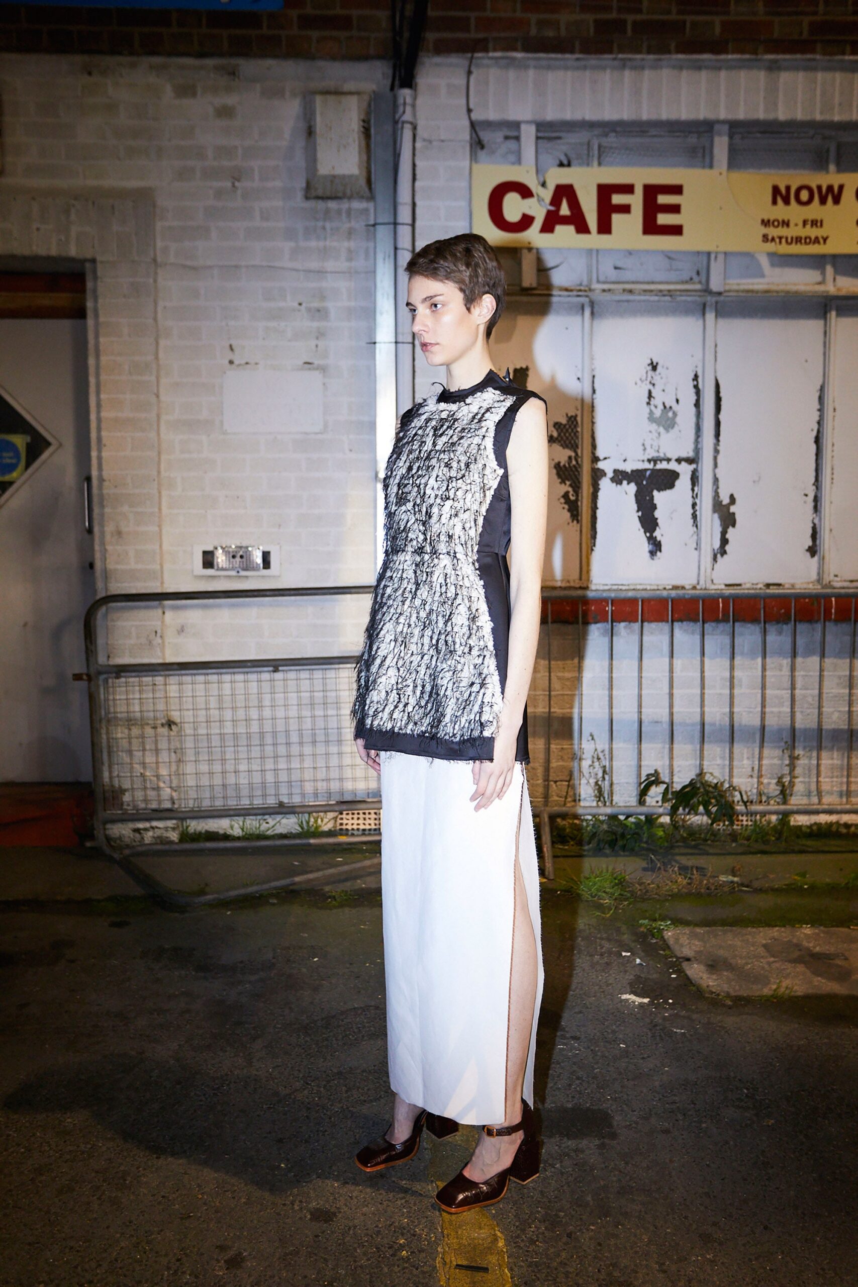 black and white fitted top with midi skirt