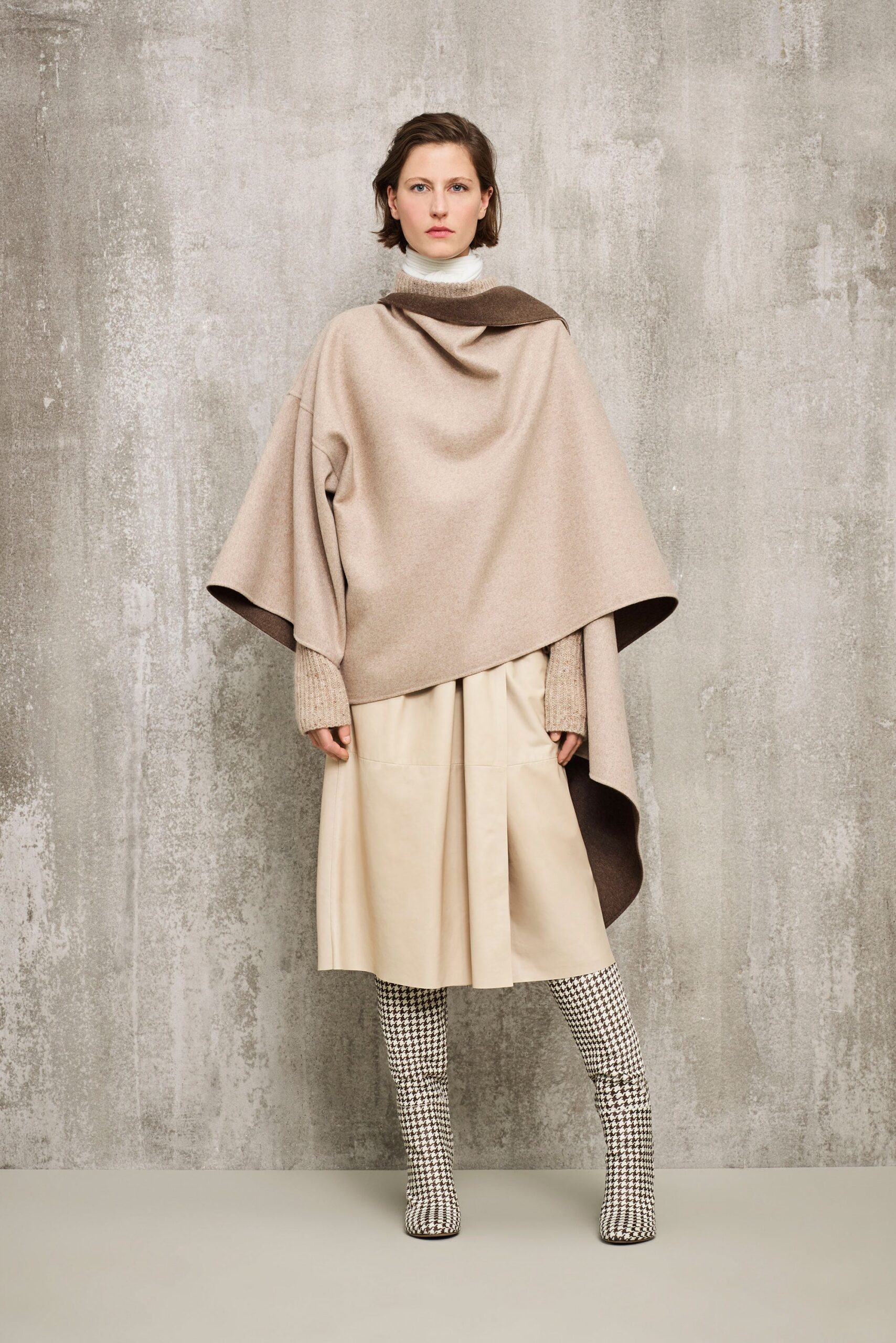 beige wool sleeveless relaxed draped poncho