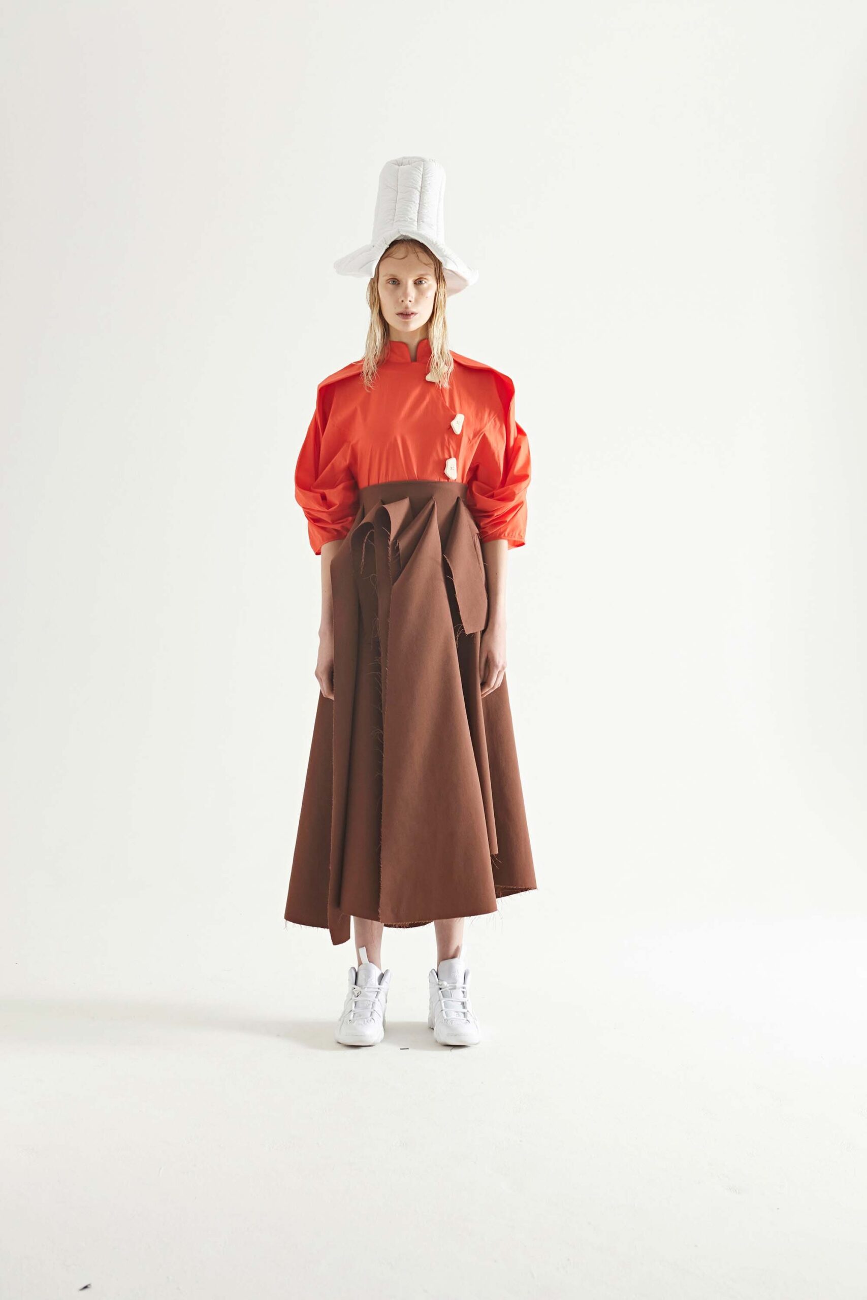 orange relaxed top with brown midi skirt