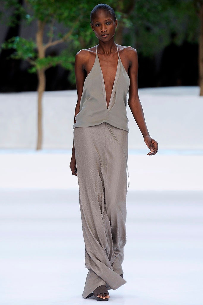 gray silk sleeveless top and wide-leg pants