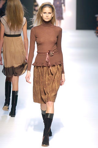 brown fitted top with gold skirt