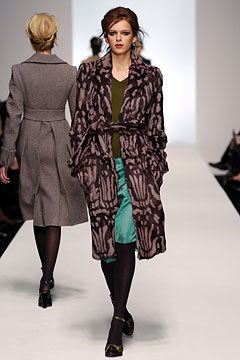 purple printed coat with green top
