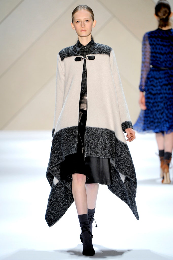 black wool long-sleeve collared relaxed layered midi coat