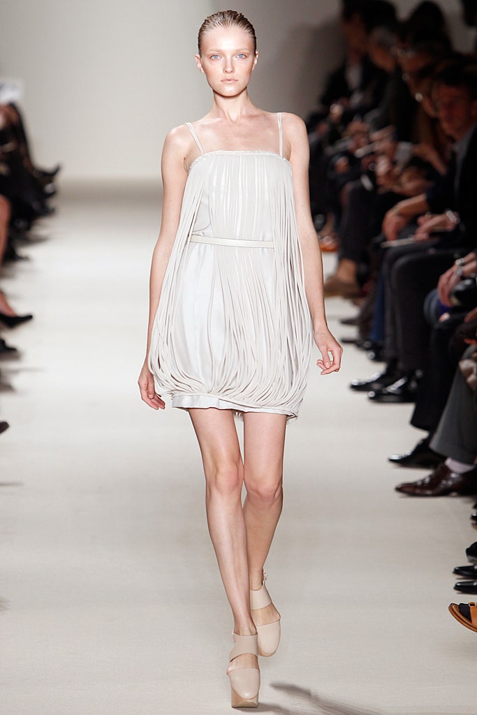 white silk sleeveless dress
