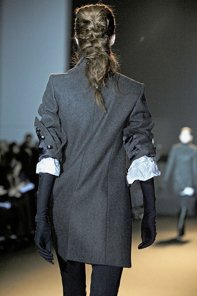 gray tailored coat with gloves