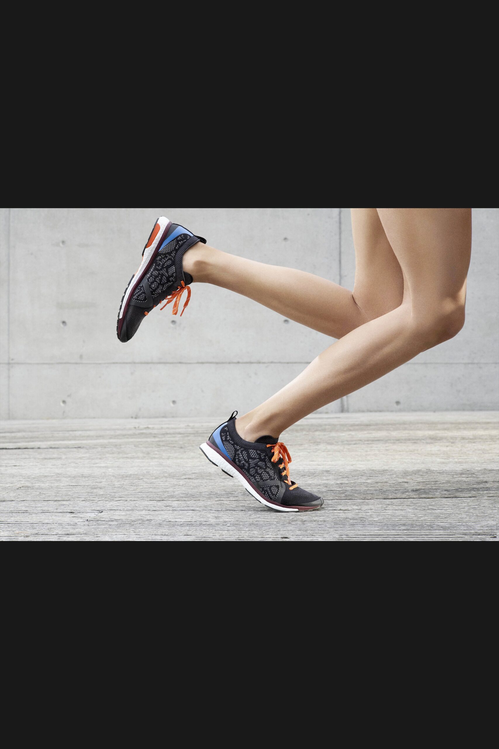 black and orange mesh shoes