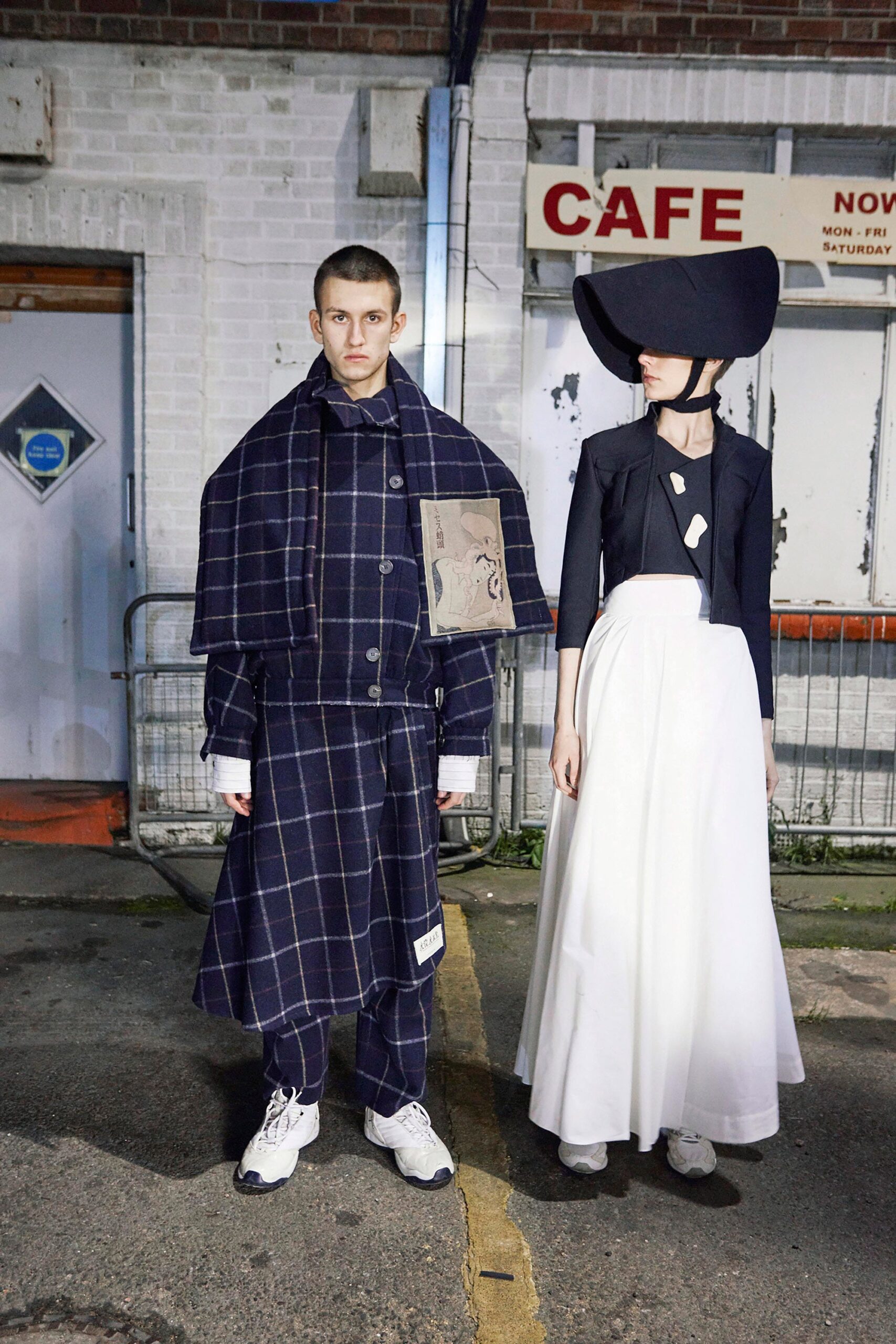 blue checked coat and white skirt