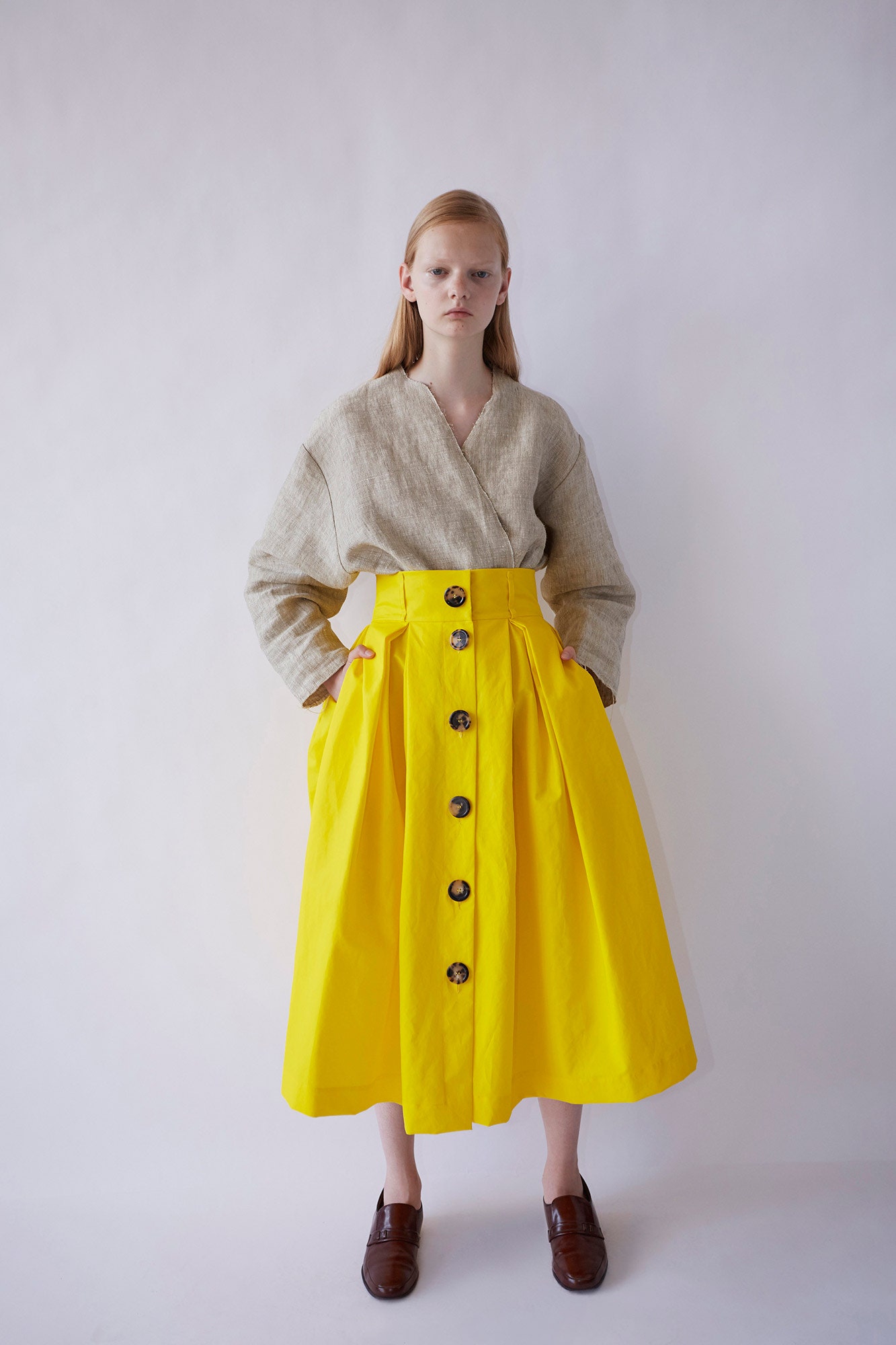 yellow cotton fitted pleated buttoned midi skirt
