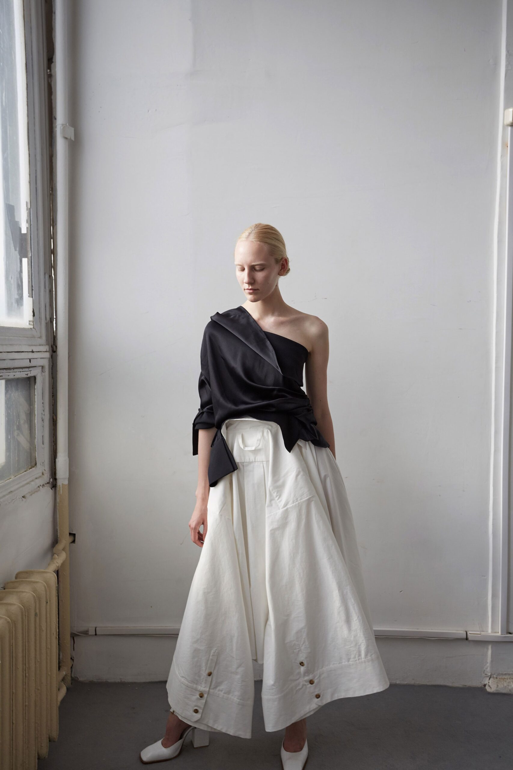 white cotton relaxed high-waisted pleated buttoned midi skirt