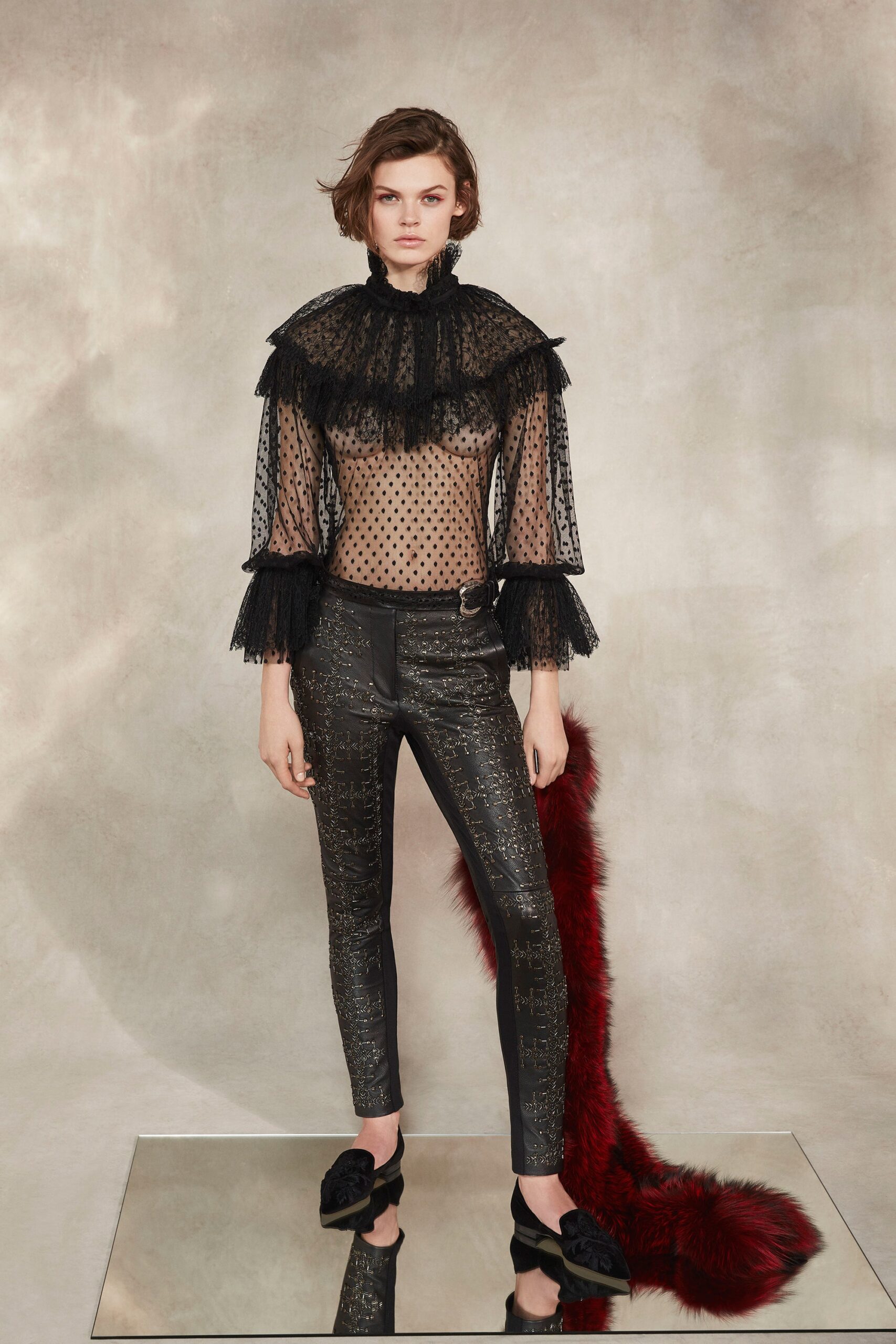 black lace blouse with leather pants
