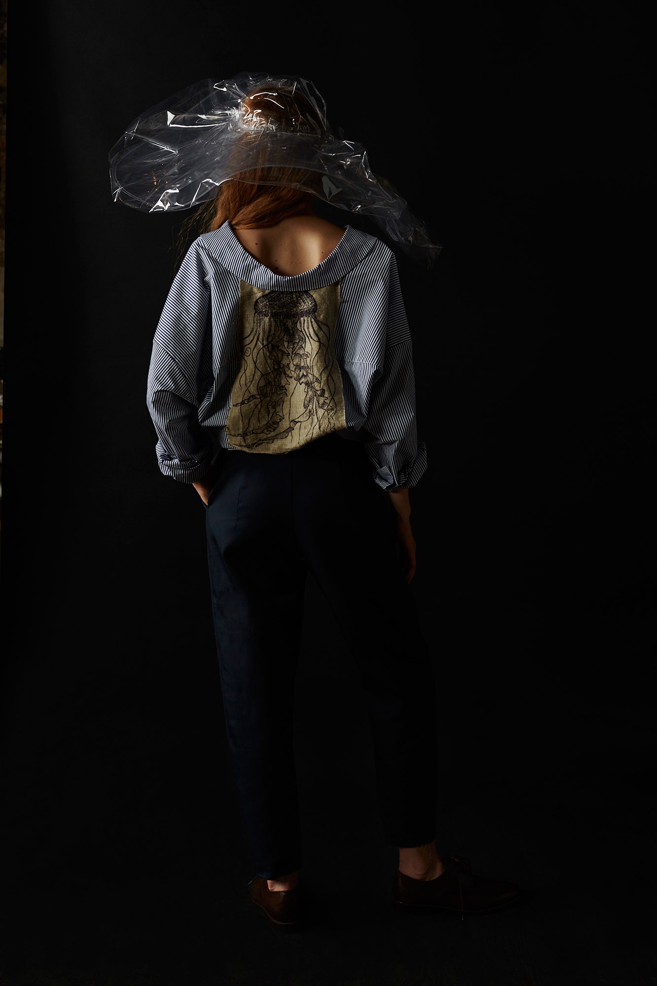 blue printed top with black pants