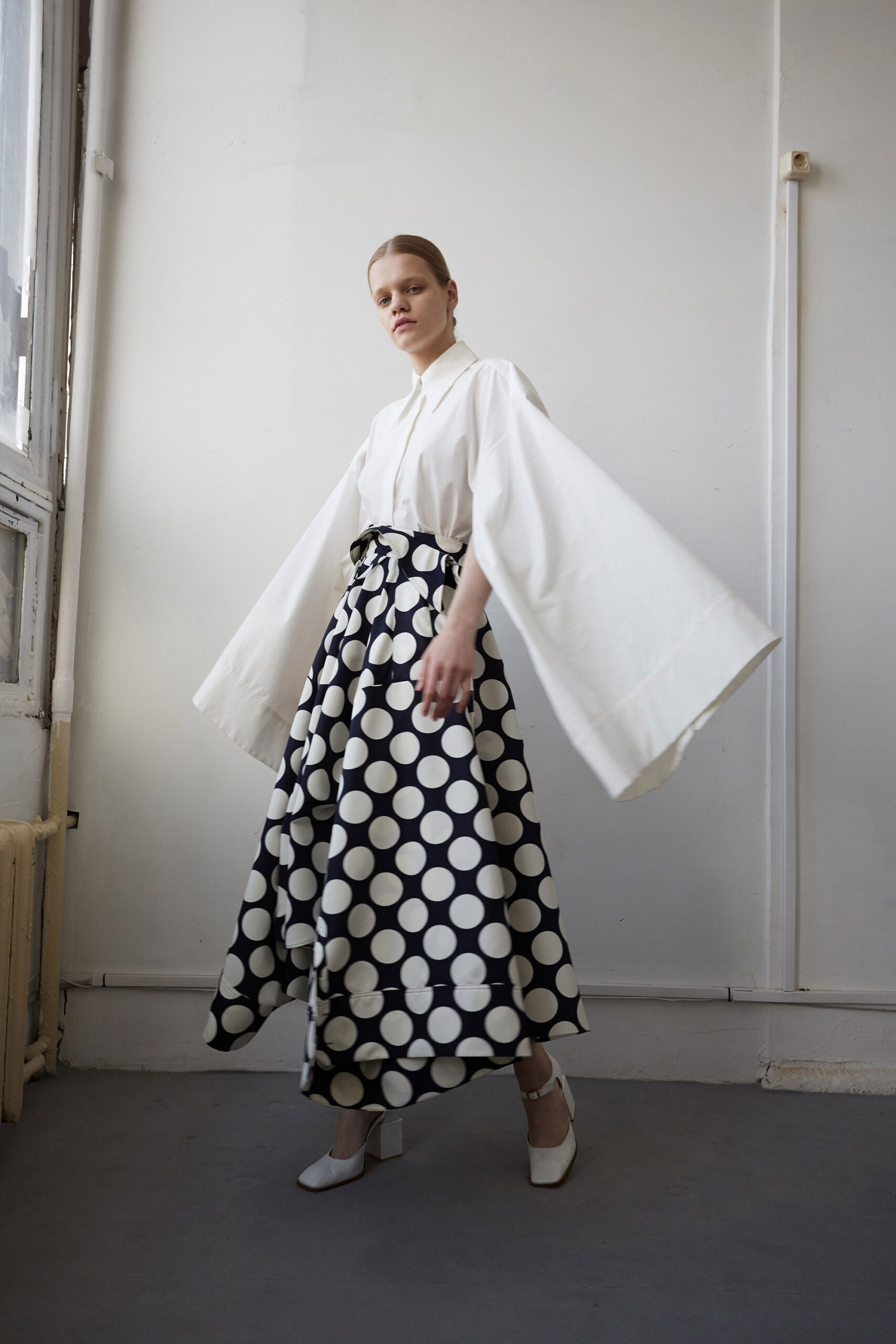 black cotton fitted pleated a-line maxi skirt