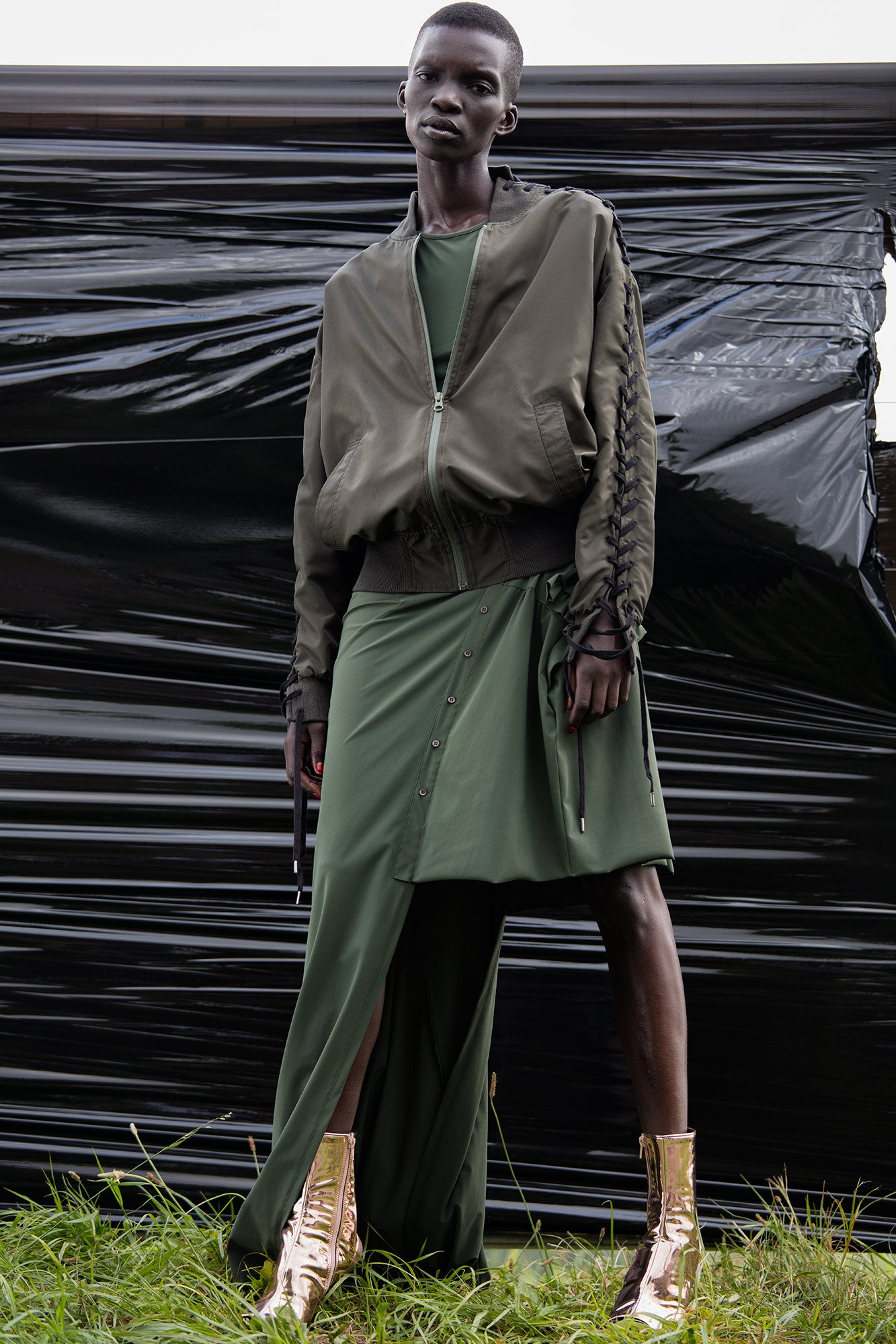 green fitted jacket and dress