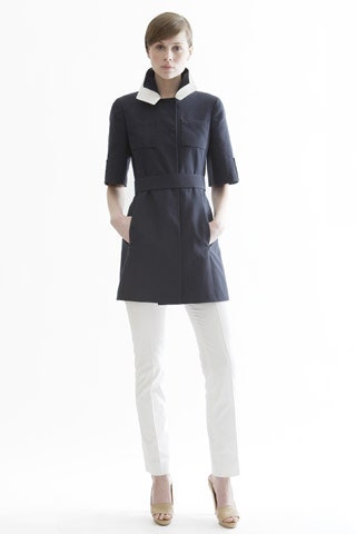 blue cotton short-sleeve collared fitted zippered pockets coat