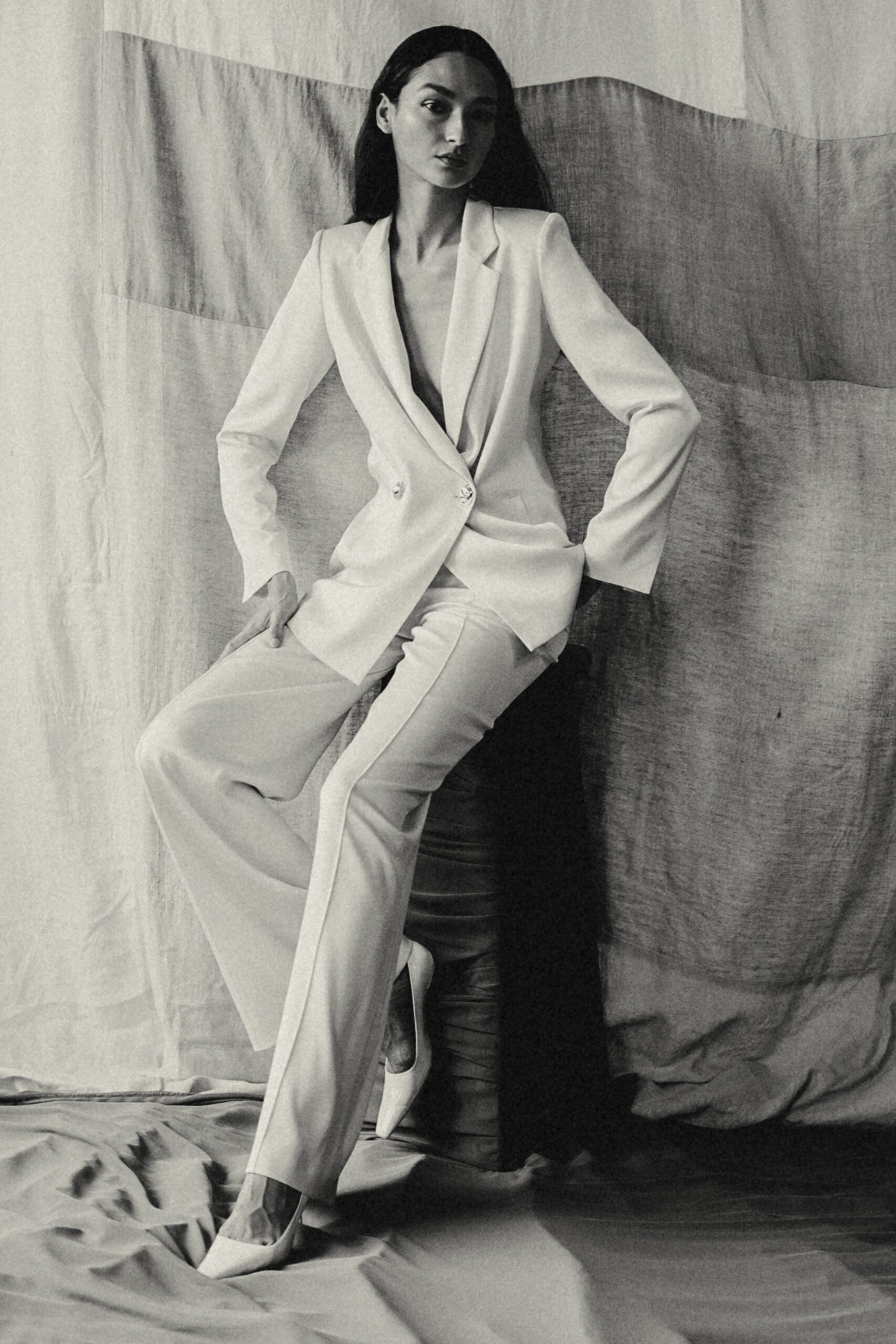 white tailored suit with heels