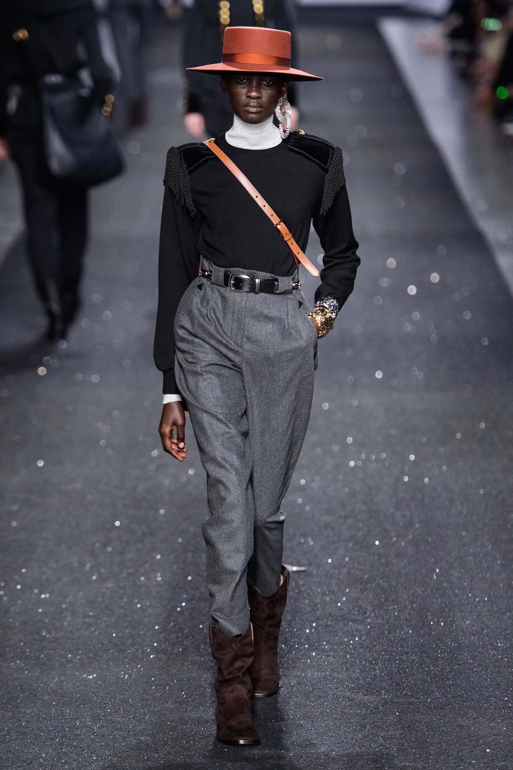 black fitted top with gray pants