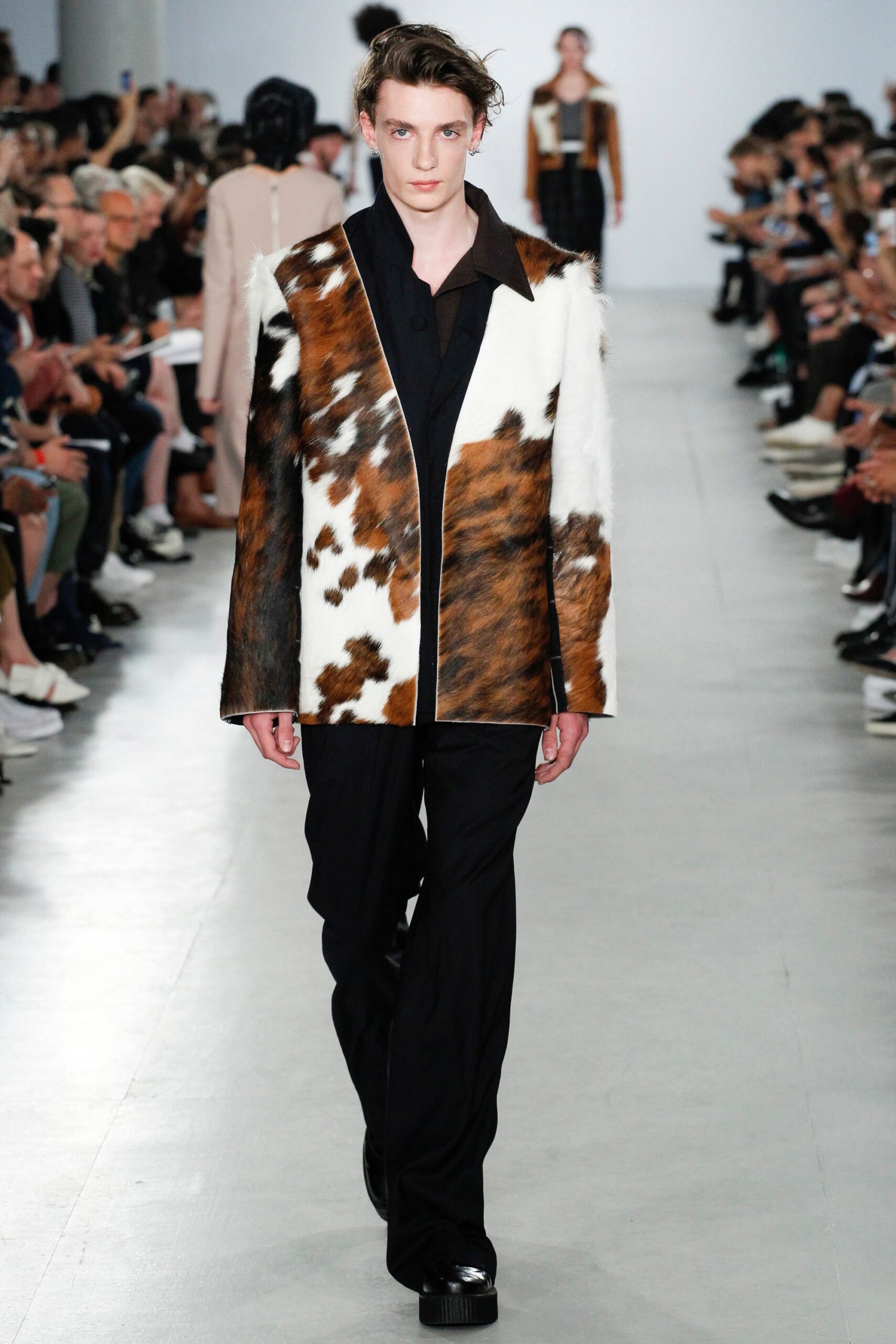 brown and white fur jacket with black shirt and pants