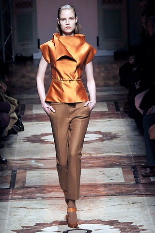 orange silk sleeveless high-neck fitted draped top