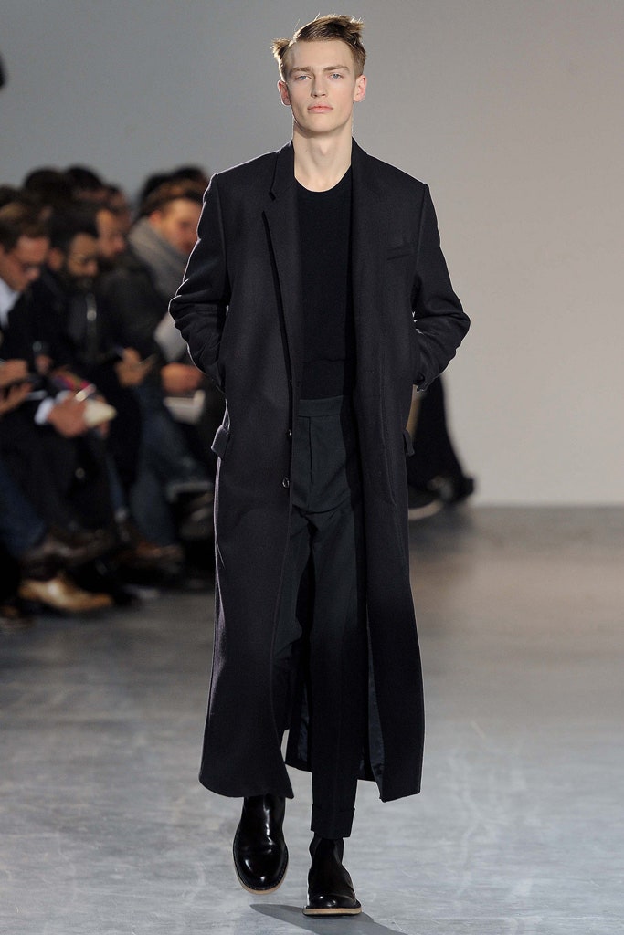 black wool coat with tailored pants