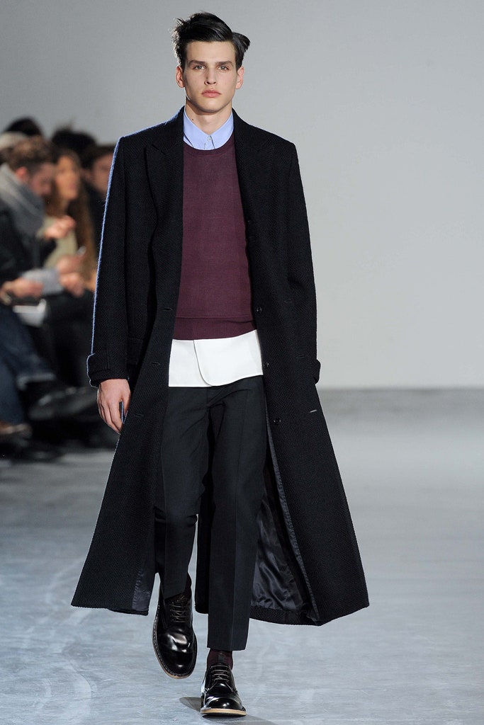 black wool coat with purple sweater