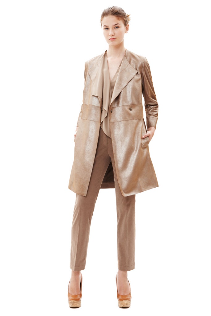gold silk tailored coat with beige pants