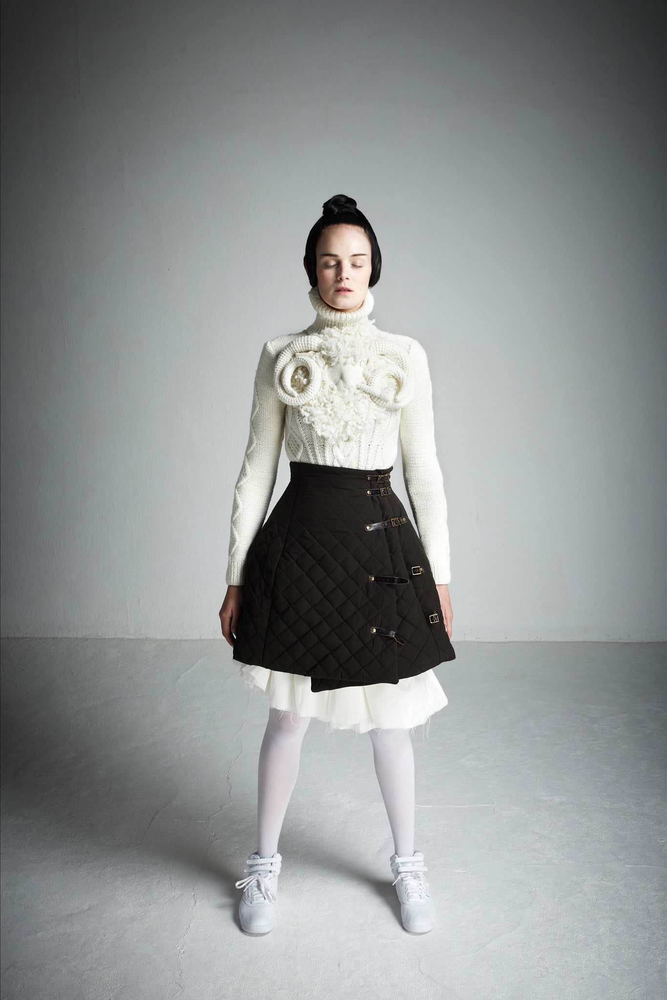 white fitted sweater and brown skirt