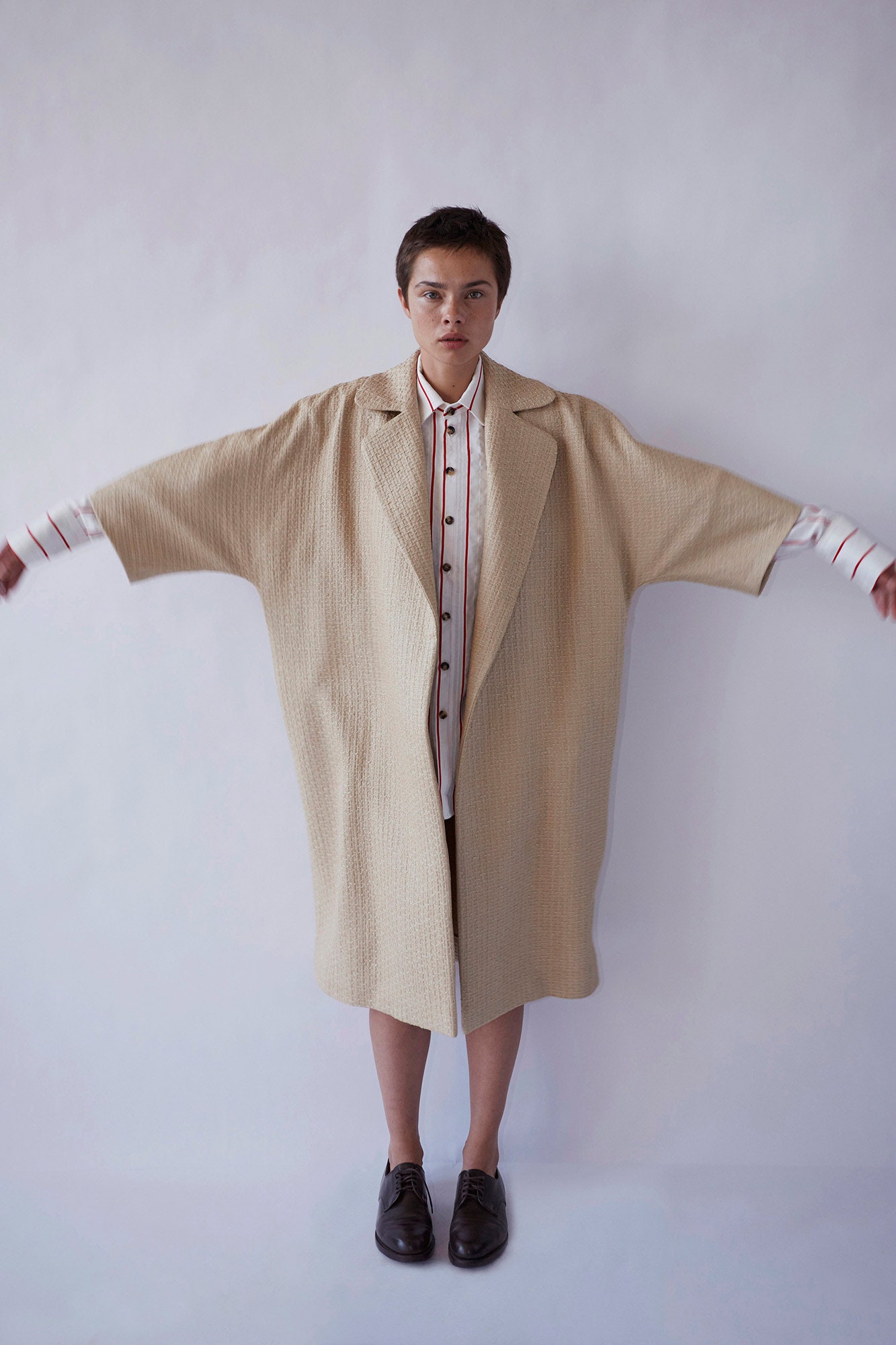 beige cotton long-sleeve collared oversized layered coat