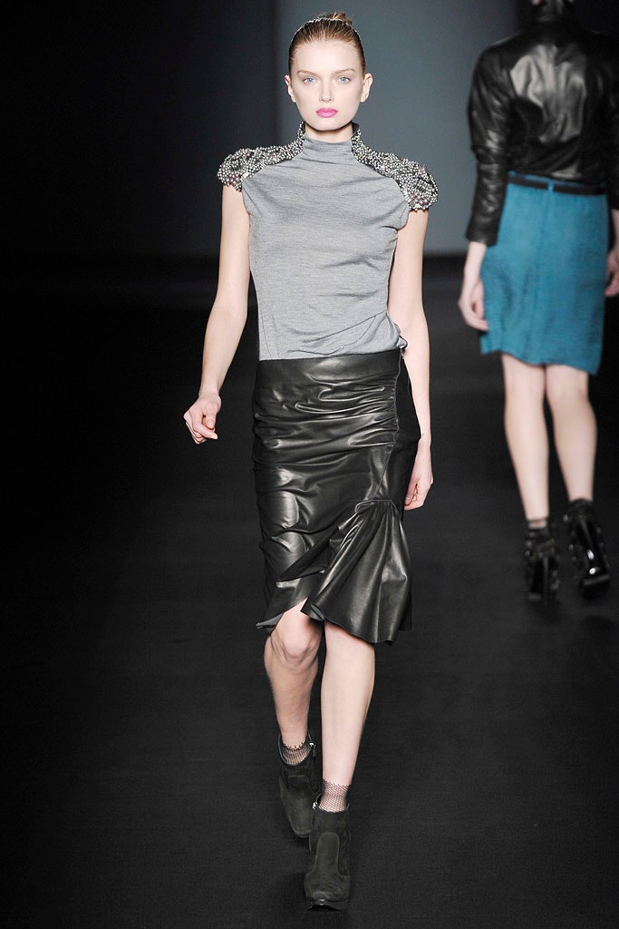 fitted gray top with black skirt