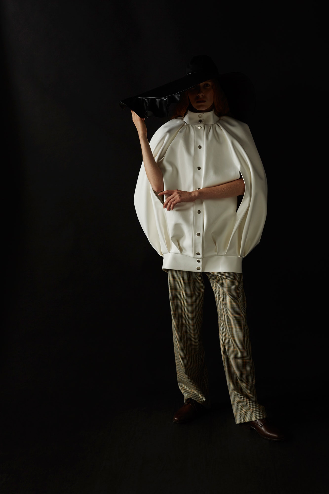 white cotton cape and gray checked pants