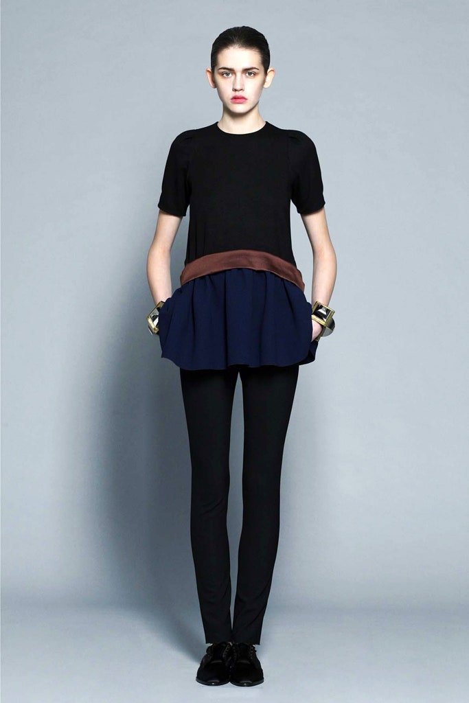 black fitted top with layered design
