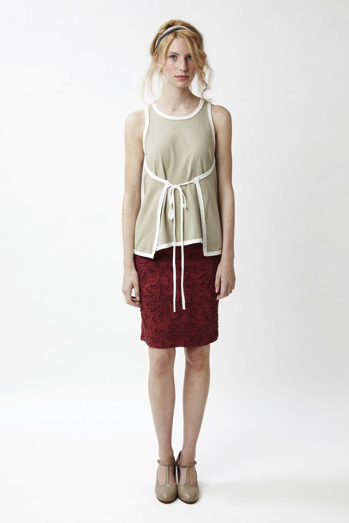 beige relaxed top with red pencil skirt