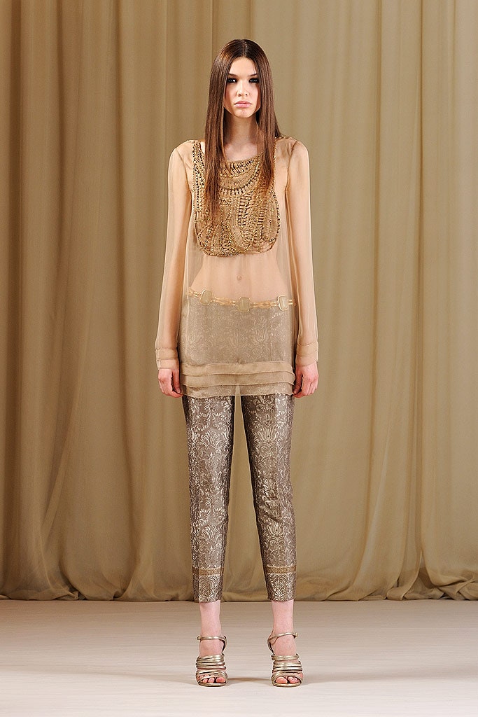 beige chiffon top with gold pants