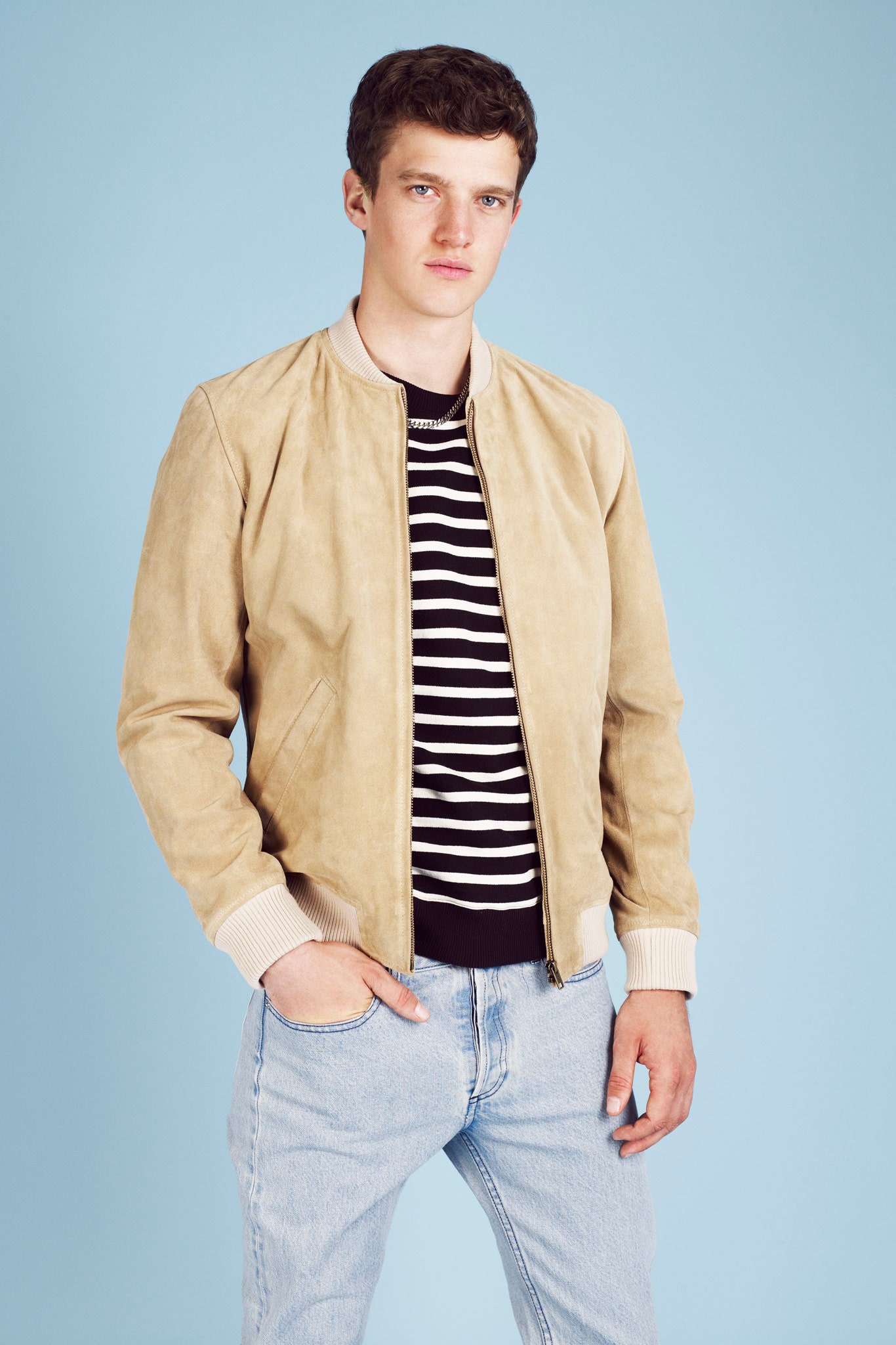 beige suede jacket with striped t-shirt