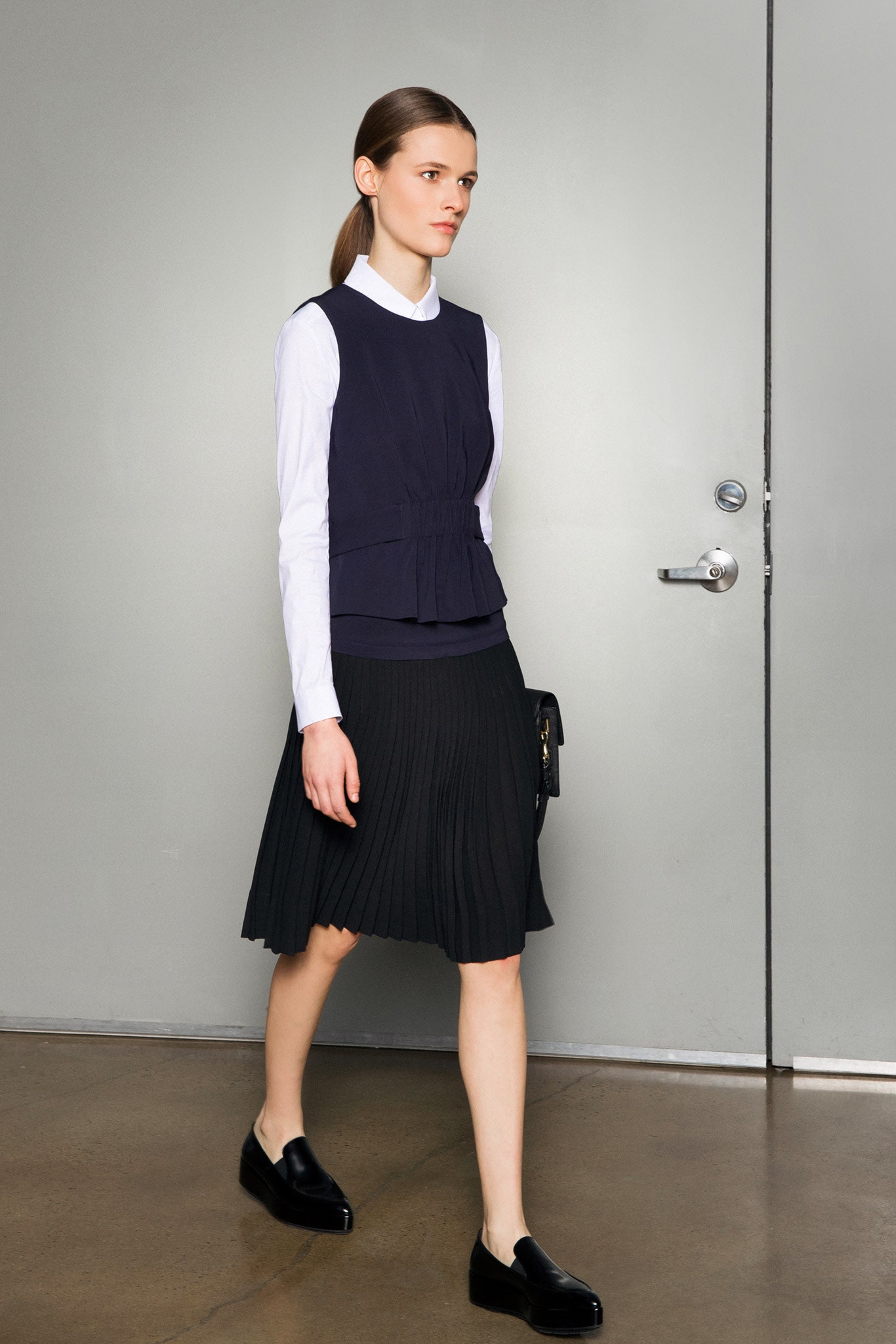black long-sleeve fitted pleated midi skirt