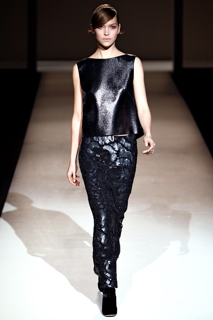 black silk top and sequin pants