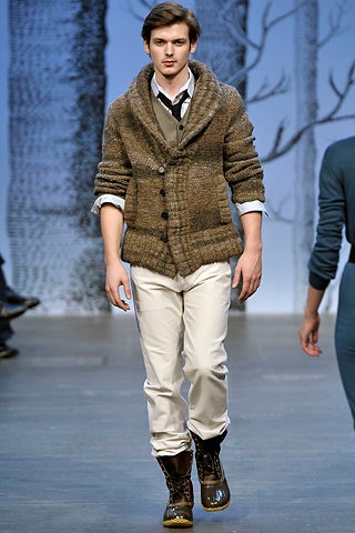 brown wool sweater with white pants
