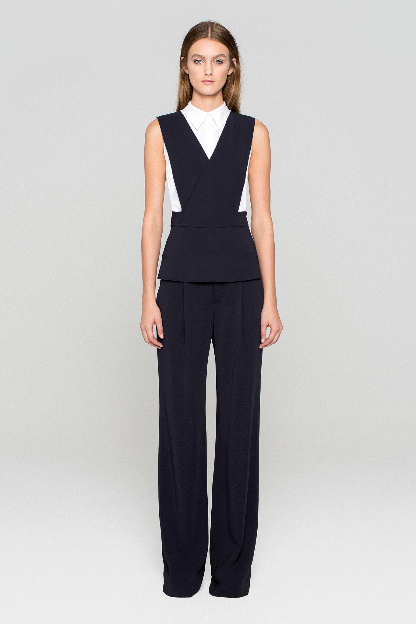 white sleeveless collared fitted top