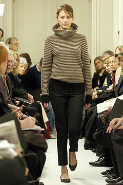 striped brown beige sweater with black pants