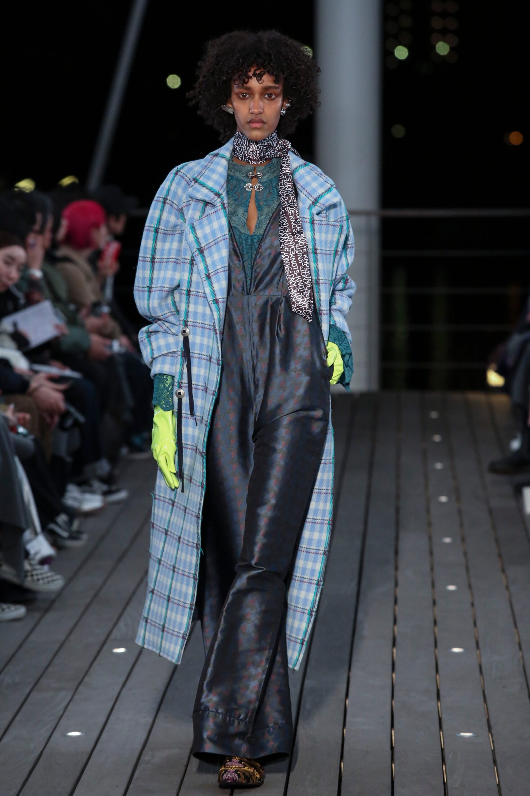 blue checked coat with green top