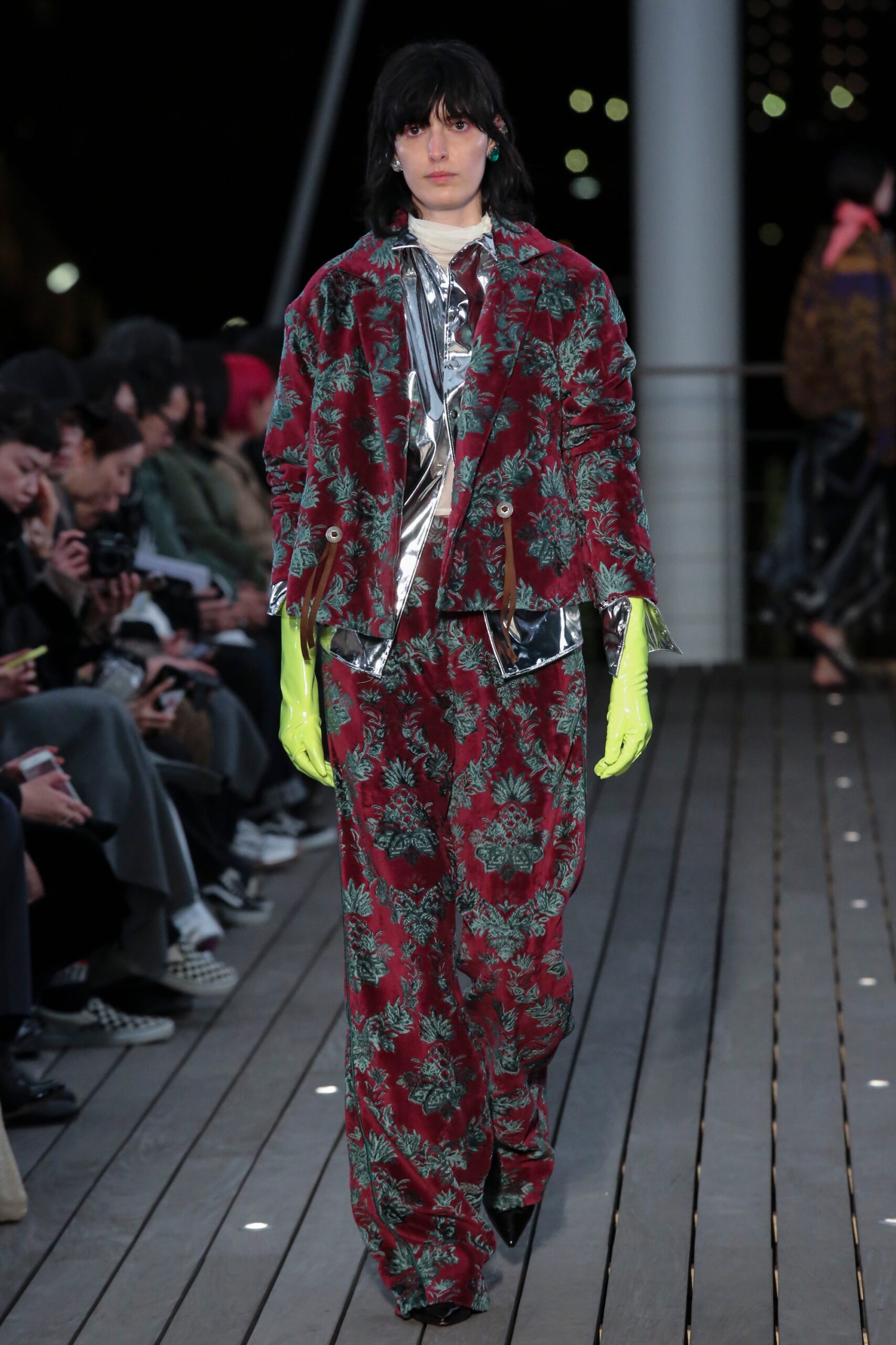 A relaxed fit red floral silk jacket paired with matching pants, featuring long sleeves and a collared design.
