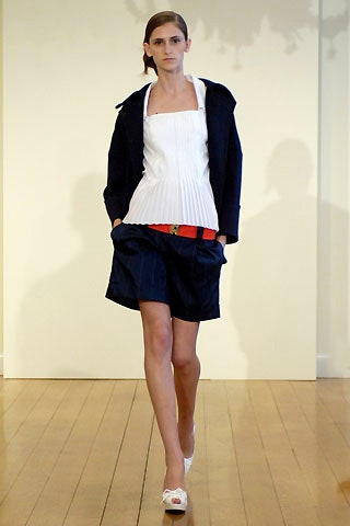 navy jacket white pleated top