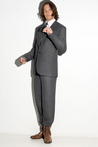 gray tailored suit with brown shoes