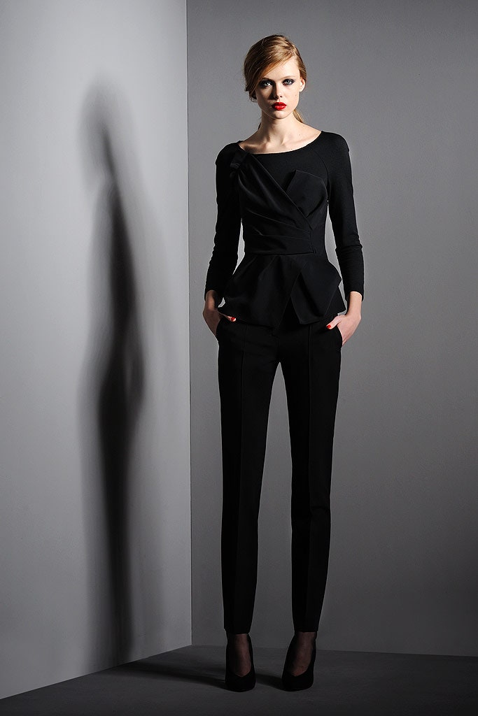 black fitted top and slim pants