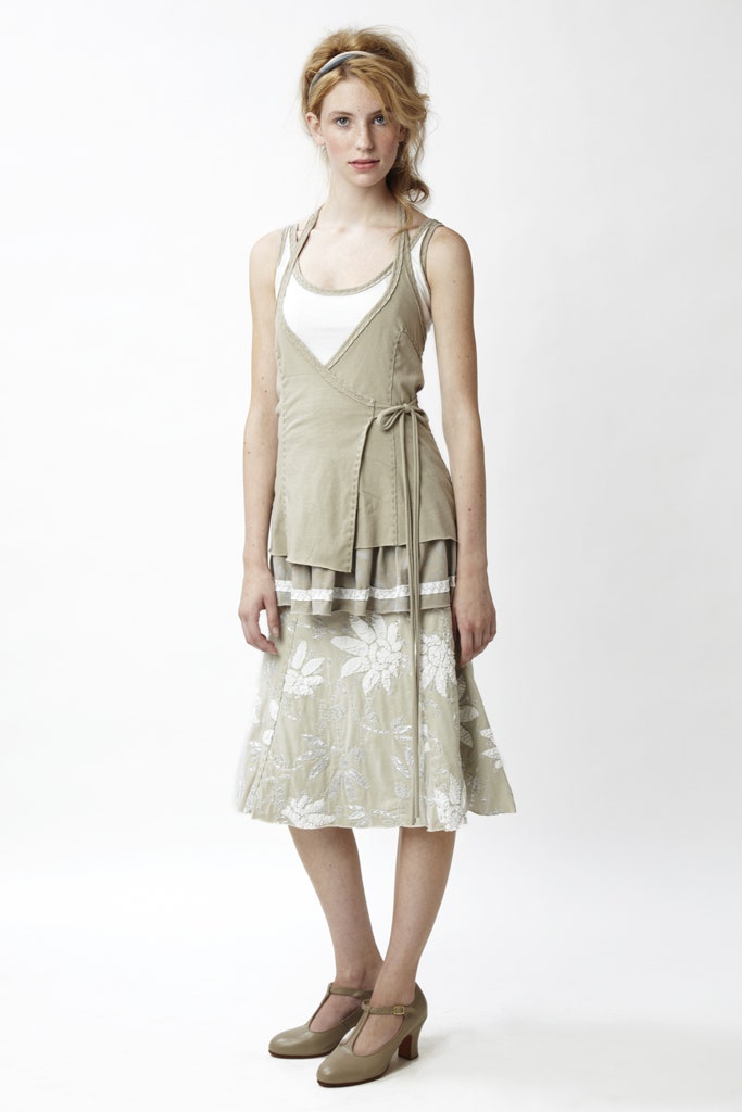 beige fitted layered top and flared midi skirt