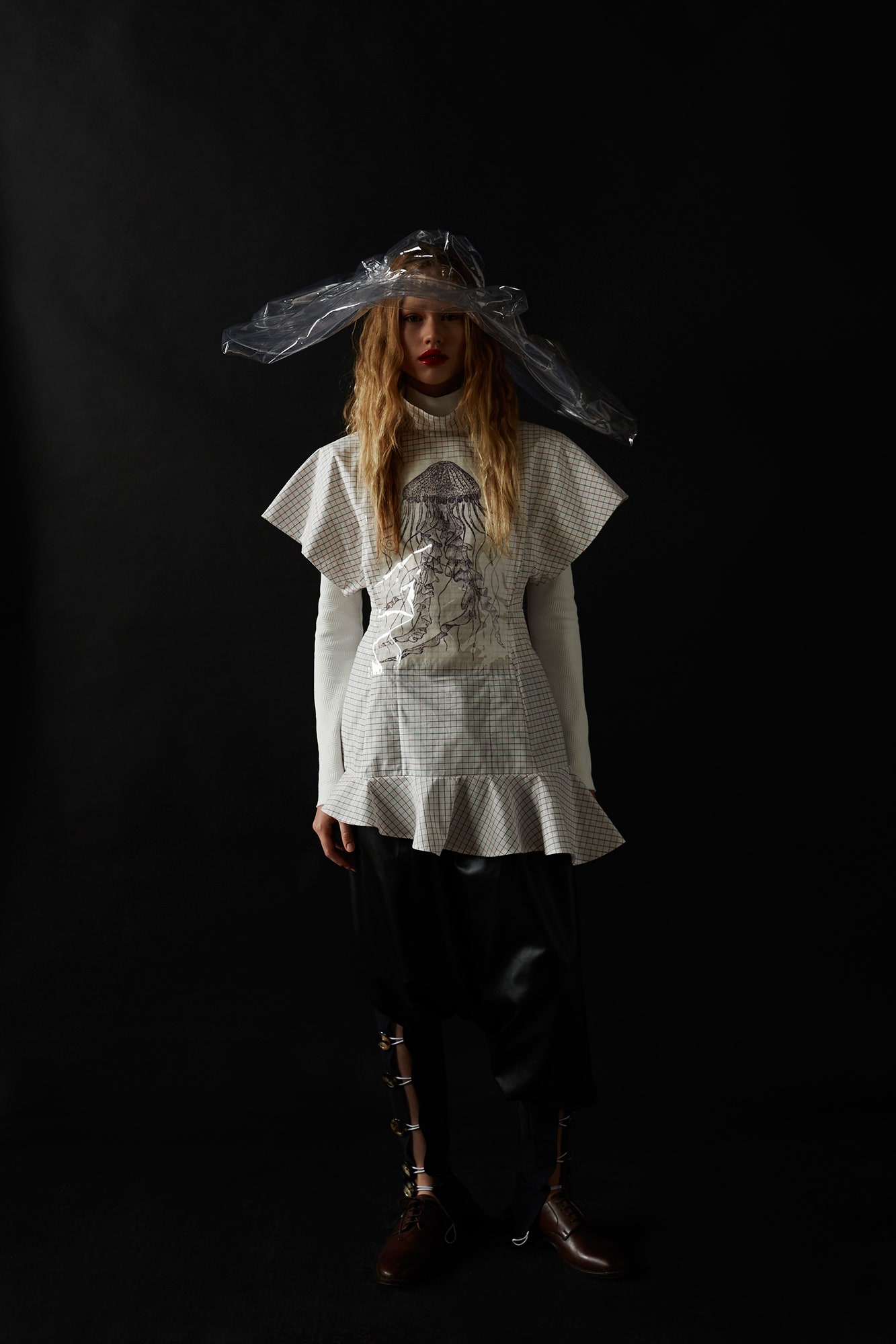white pleated top with black pants