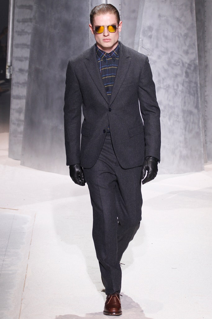 gray tailored suit with sunglasses