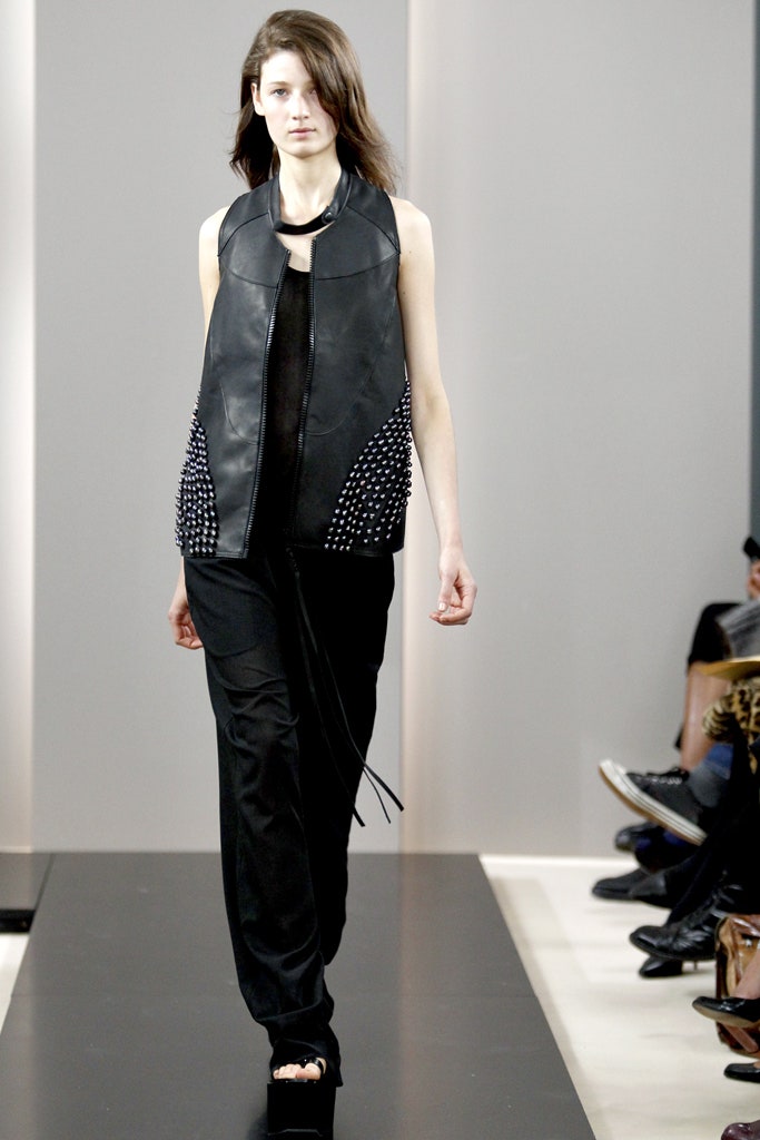 black leather vest and pants